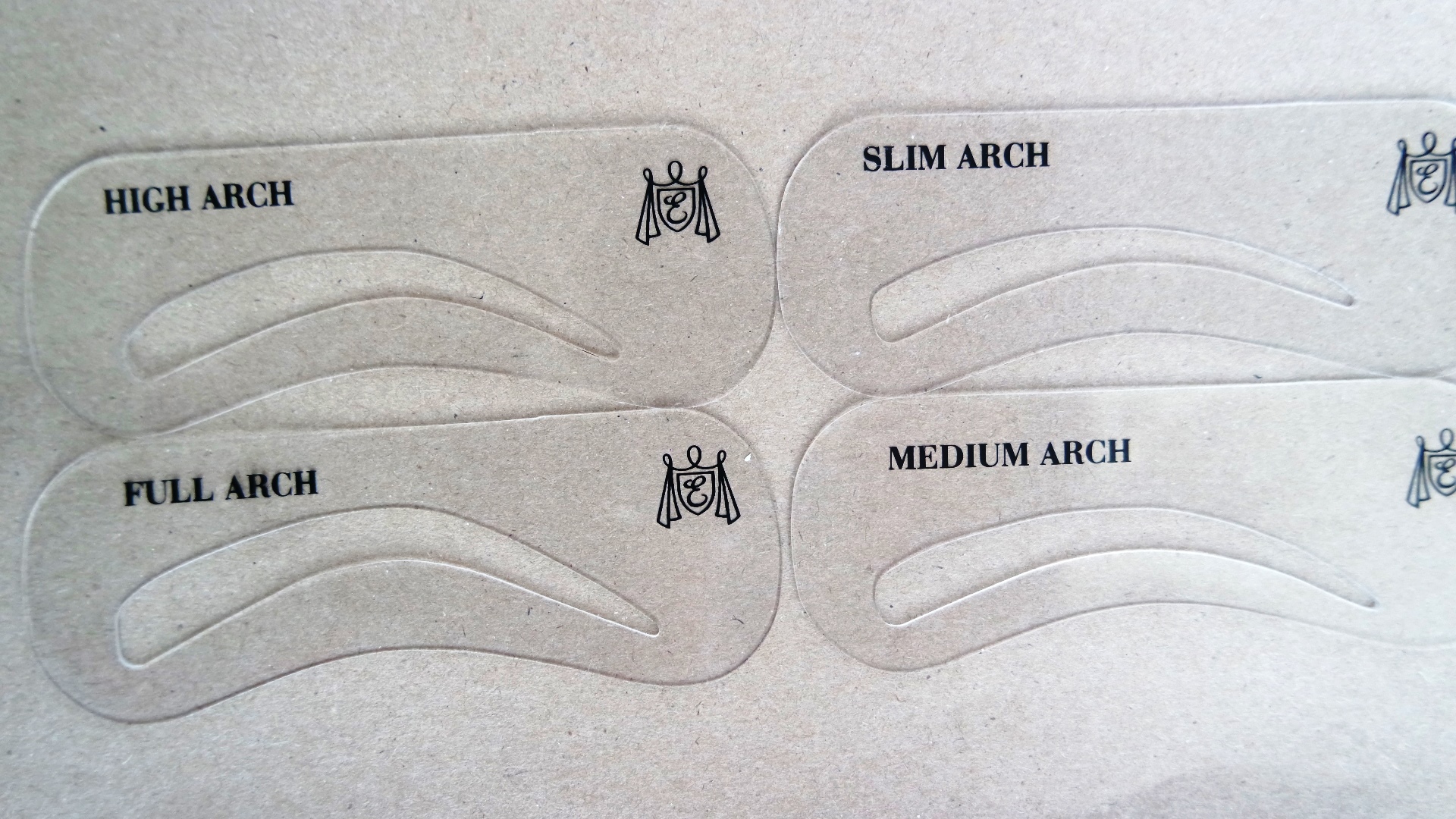 Shaping eyebrows using an eyebrow stencil - the different arches available